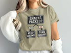 T-shirt with "Snacks Packed? Yes Keep Hiking, No Turn Around" flowchart design.