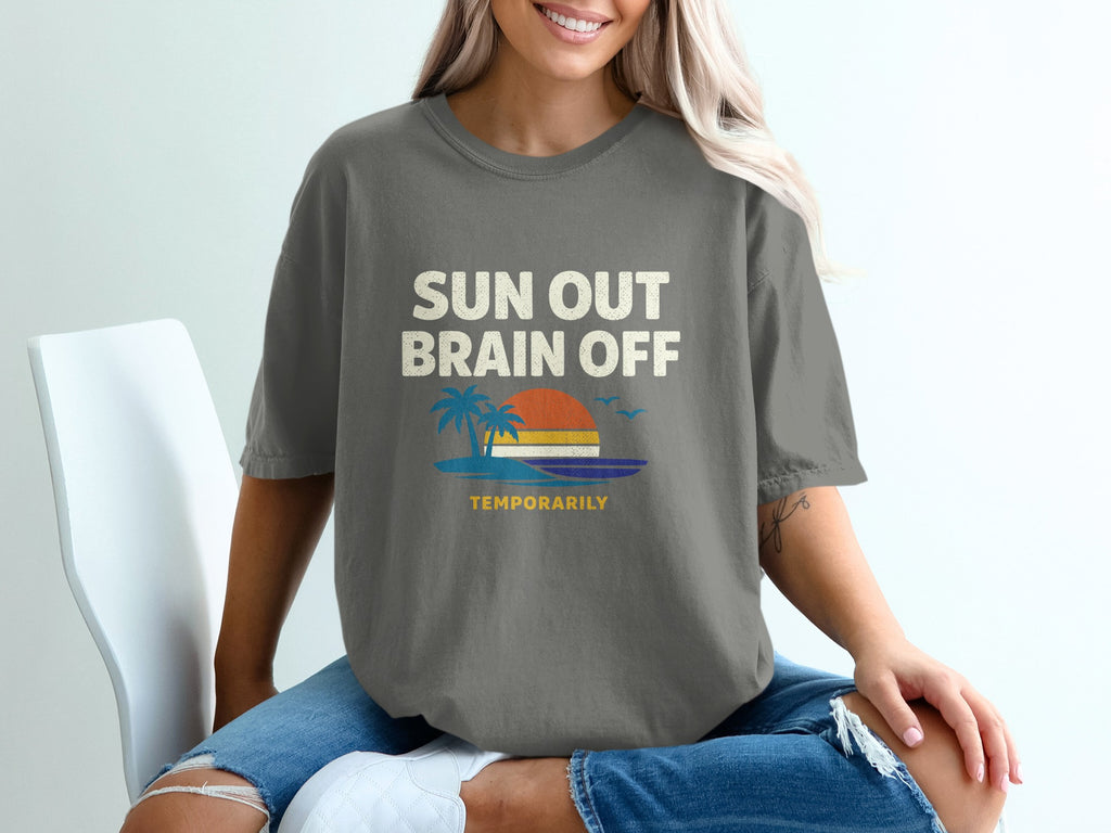 Gray t-shirt with "Sun Out Brain Off Temporarily" graphic.