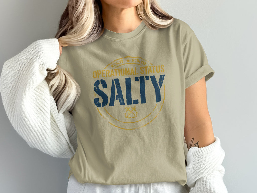 Tan t-shirt with "SALTY" and nautical anchor design.