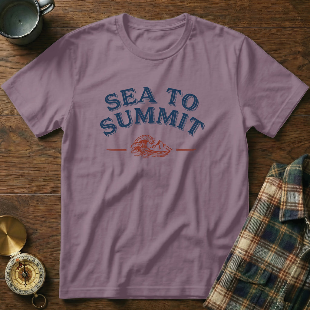 Purple t-shirt with "SEA TO SUMMIT" text and wave and mountain graphic.