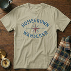T-shirt with "HOMEGROWN WANDERER" text and compass graphic.