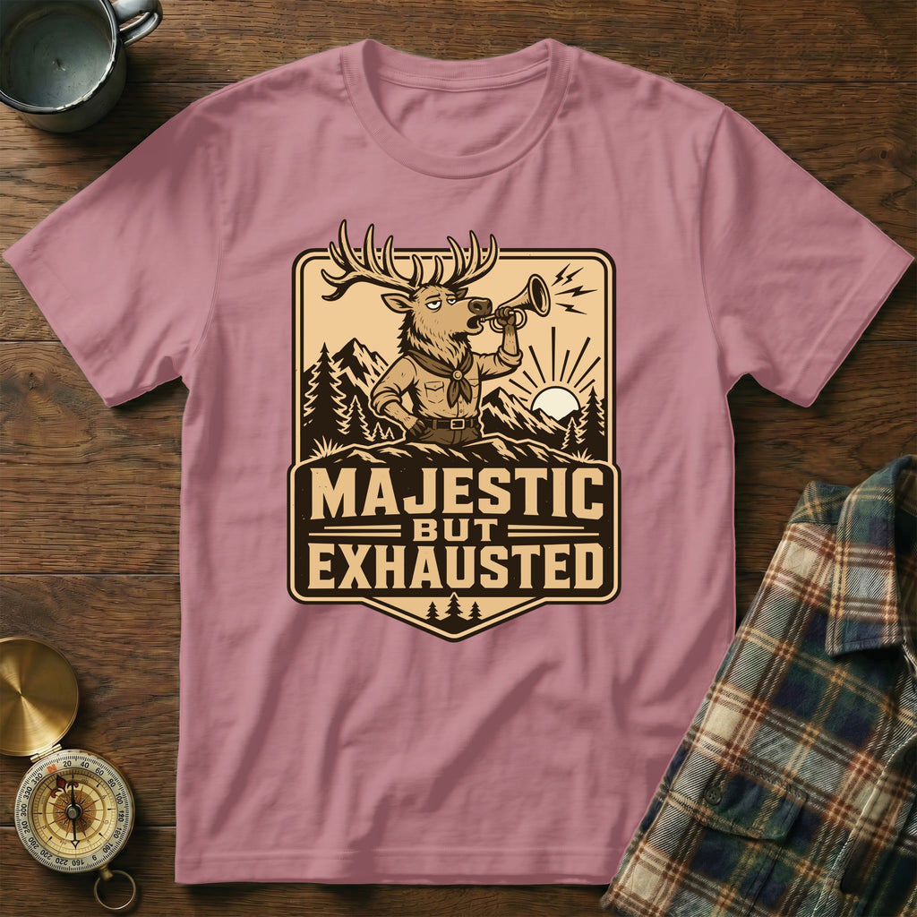 Pink t-shirt with "Majestic but Exhausted" text and cartoon elk design.