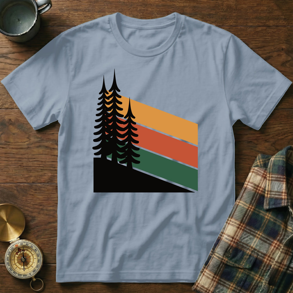 Light blue t-shirt with stylized trees and colorful stripes.